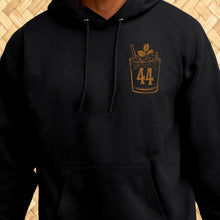 Black pullover hoodie featuring vintage '44 Mai Tai cocktail artwork on the left chest.