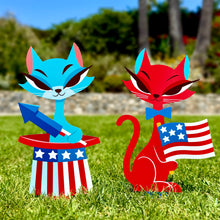 Colorful metal yard stakes featuring two patriotic cats for Independence Day decor, ideal for festive gardens.