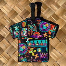 Vibrant 'Calling All Spirits' Aloha luggage tag featuring colorful designs, faux leather, and adjustable strap.