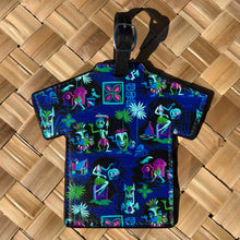 Vibrant 'Headhunting Ghosts' Aloha luggage tag with tropical design, faux leather, and buckle strap for easy identification.