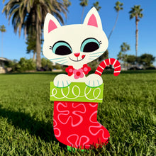 Festive cats metal yard stake in a red stocking, showcasing colorful design ideal for holiday decor. Set of two.