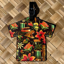 Vibrant 'Piranha River Cruise' Aloha luggage tag featuring playful designs, faux leather, and adjustable strap.