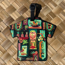 Vibrant 'Gateway to Tiki' luggage tag featuring colorful tropical designs and strap with buckle closure.