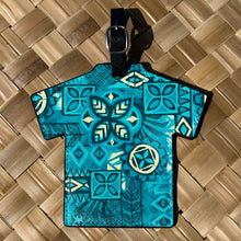 Jeff Granito's 'Marine Tapa' luggage tag features a vibrant Hawaiian shirt design and a buckle strap for easy attachment.