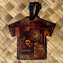 Colorful faux leather luggage tag featuring tribal designs and a buckle strap for easy identification.