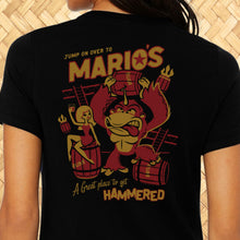 Women's black tee featuring retro design with barrel-smashing primates and \"Mario's Rum Barrel\" text.