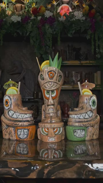 2024.09.06 PRODUCT Tiki tOnys Enchanted Tiki Room Chanting Drummer and Orange and Green Side Drummer Tiki Mugs — Instagram C_lj-blS5XC