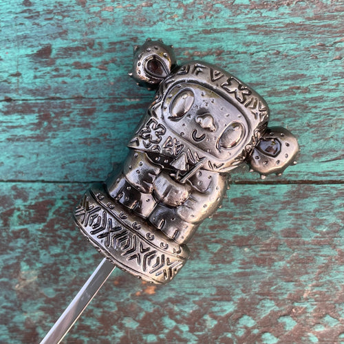 Tiki tOny's 'Yum Grub' Sculpted Metal Swizzle Stick by TikiLand Trading Co.