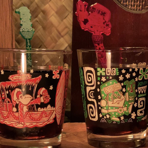 Trader Santa’s TikiLand Trading Co. Mai Tai Cocktail Glasses Set designed by artist Tiki tOny